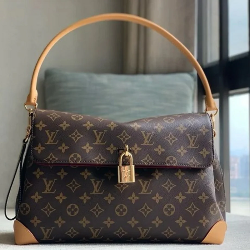 LOUIS VUITTON – HIDE AWAY MM BAG