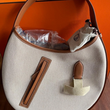 P’TIT ARÇON BAG IN CANVAS & LEATHER HERMÈS