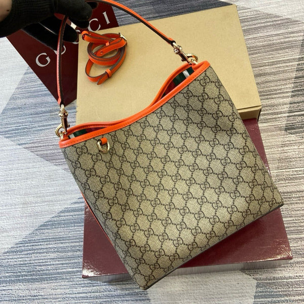 MEDIUM GG EMBLEM BUCKET BAG GUCCI
